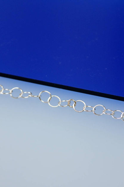 Armband Orbit | Lijn van zilveren en gouden cirkels