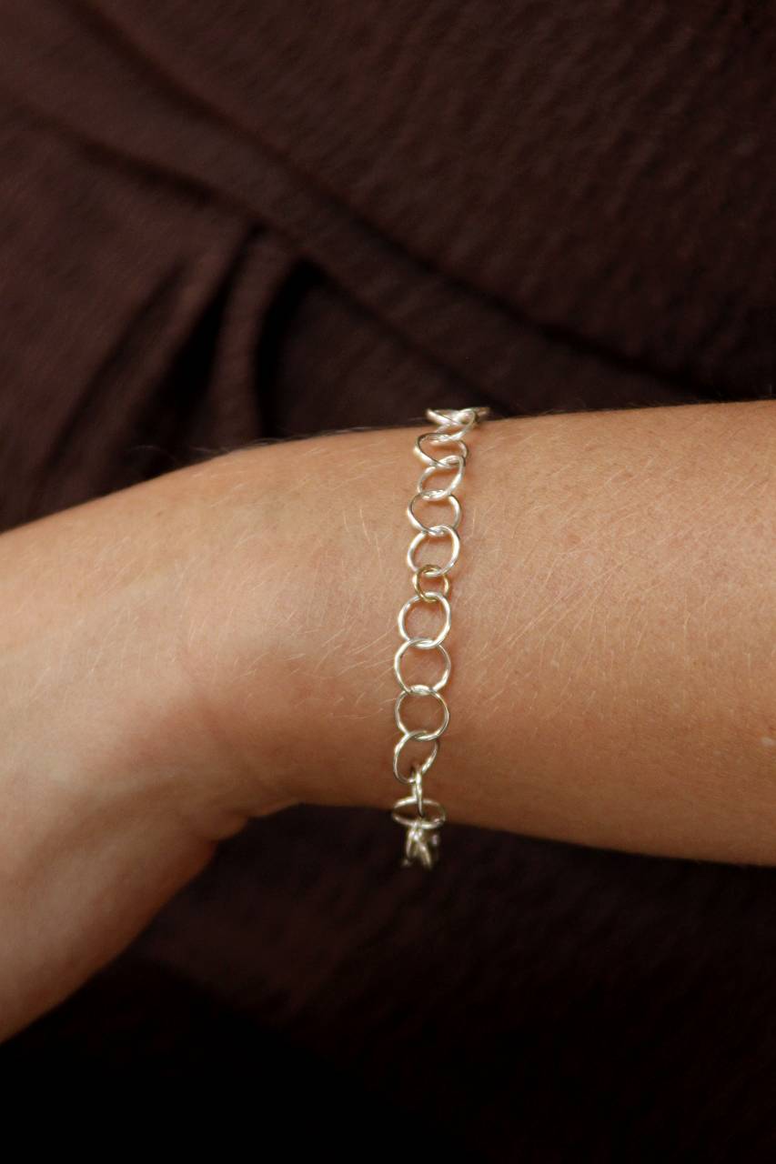 Armband Orbit | Lijn van zilveren en gouden cirkels